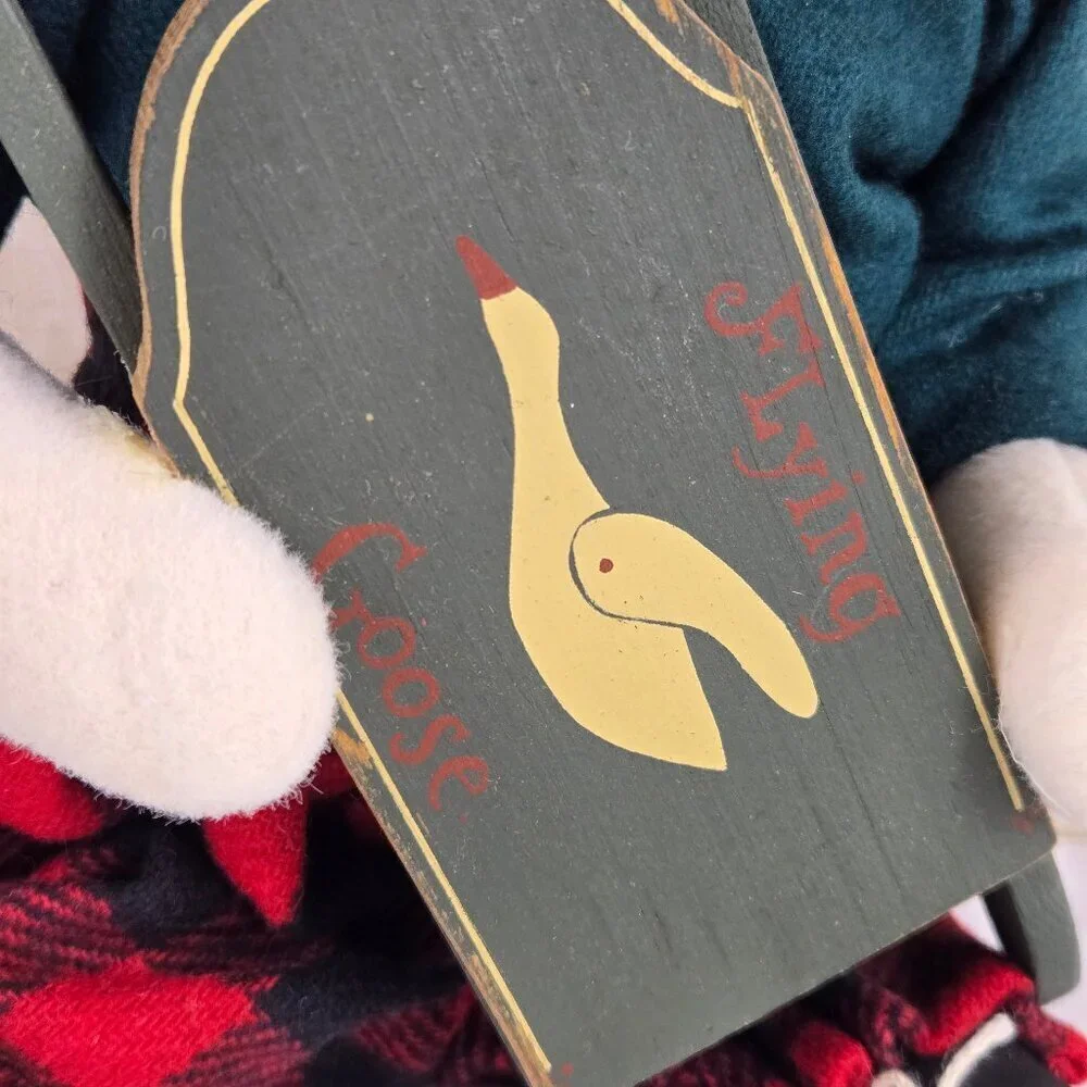 Stuffed Goose in Winter Attire Holding 